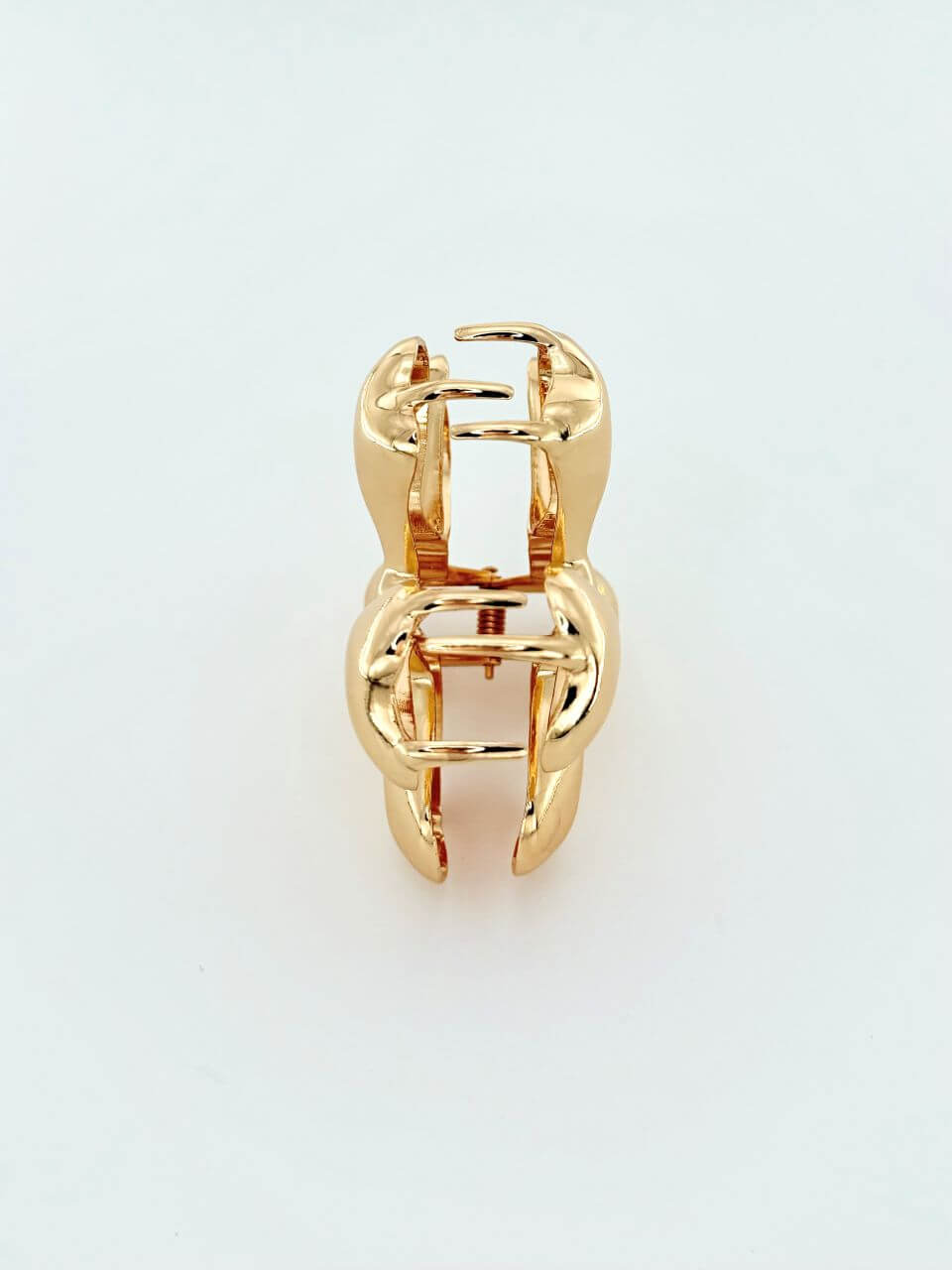 Flower-shaped hair claw in polished gold metal, Luvertta
