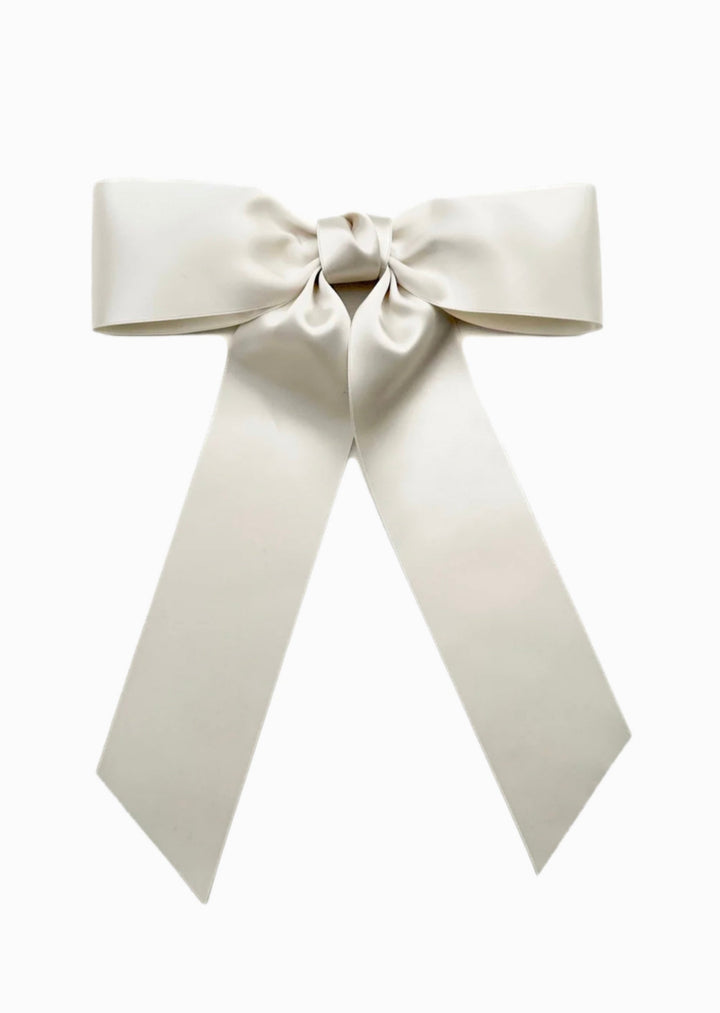 Charlotte hand-tied satin bow barrette in white, Luvertta