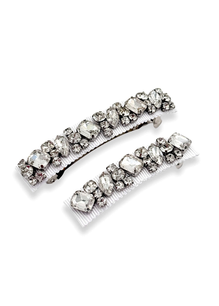 Two gold-colored metal barrette clips with embedded round and marquise rhinestones, designed for hair styling.
