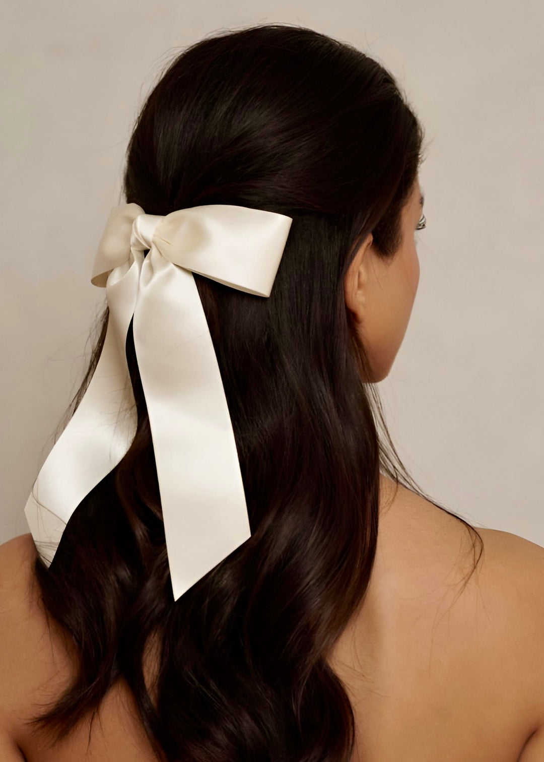 Charlotte hand-tied satin bow barrette in white, Luvertta