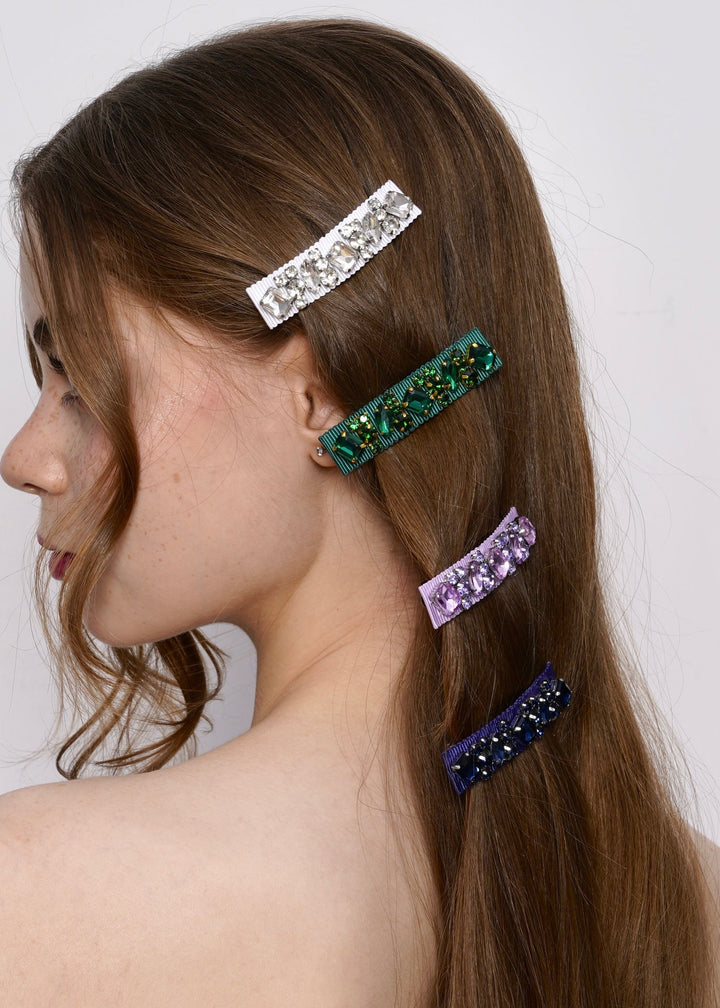 Model wearing Lauren crystal hair barrettes in a half up style, Luvertta