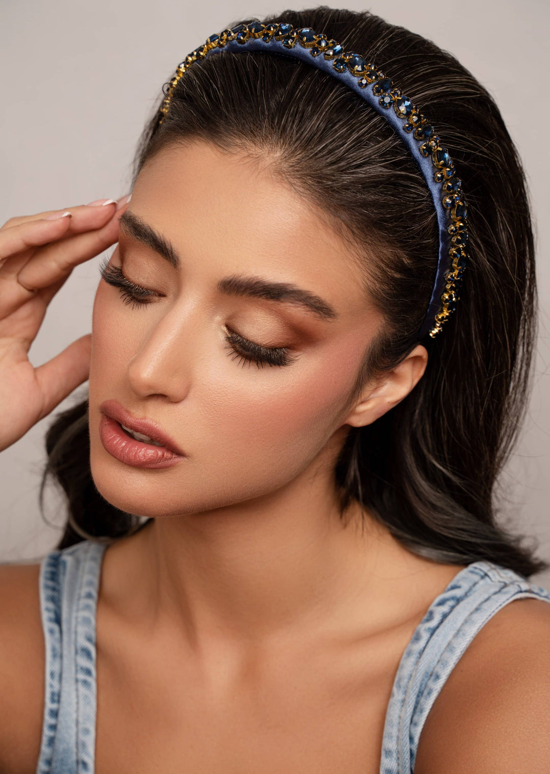 Lauren crystal bridal headband in navy blue, hand-stitched rhinestones on gold settings, Luvertta